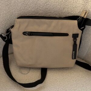 Sherpani Tan and Black Messenger Bag